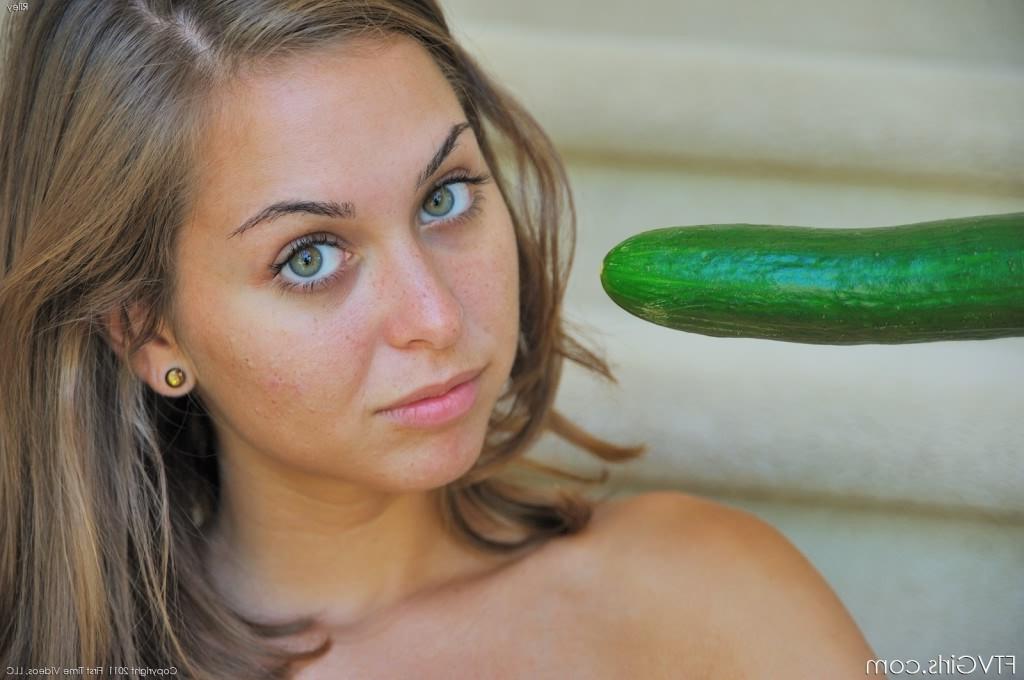 16P Nasty brunette with sexy legs toying her pussy with cucumber
