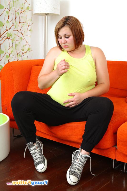 12P Sporty young fatty doesnt mind baring her melons