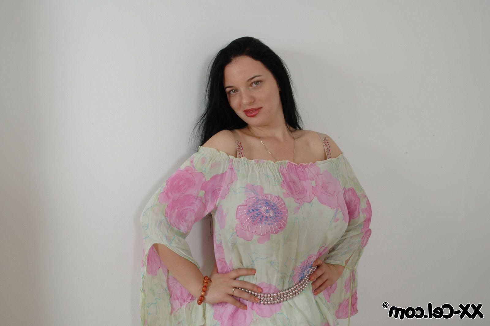 12P A naturally busty woman naked