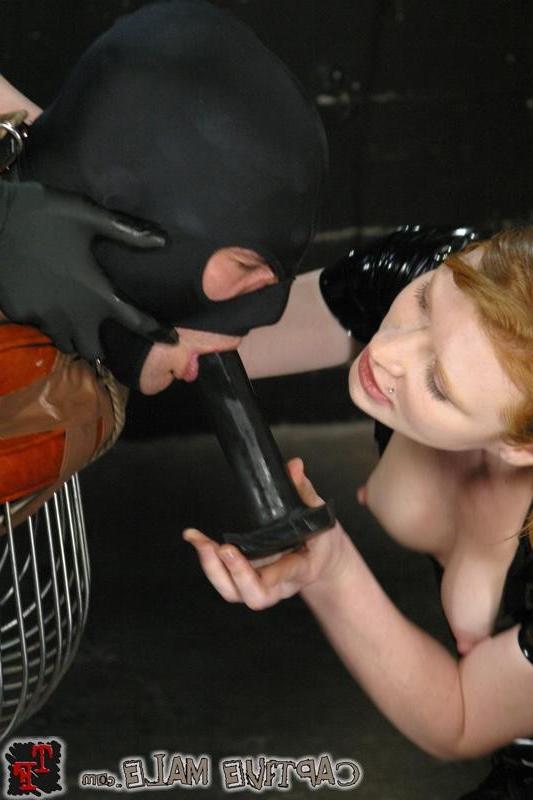 18P Two Latex Dominas having this male bound and strapon fucking