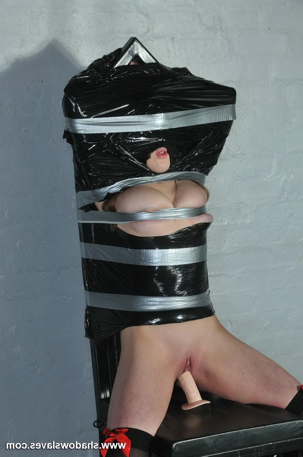 16P Amateur subbie bound in plastic tape and sat on a dildo