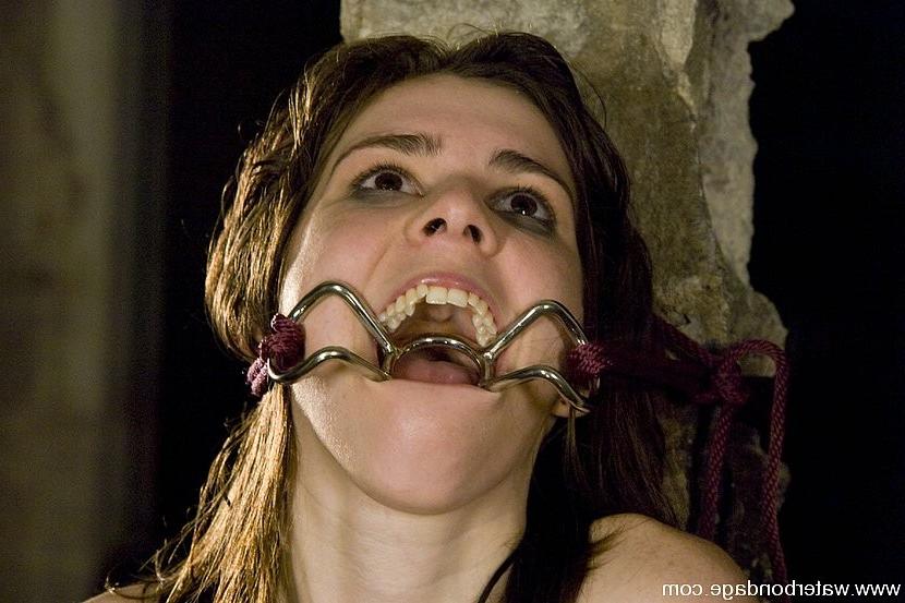 15P Isobel Wren is bound in big water tank getting nipples stretched