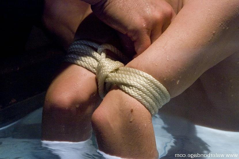 15P Isobel Wren is bound in big water tank getting nipples stretched
