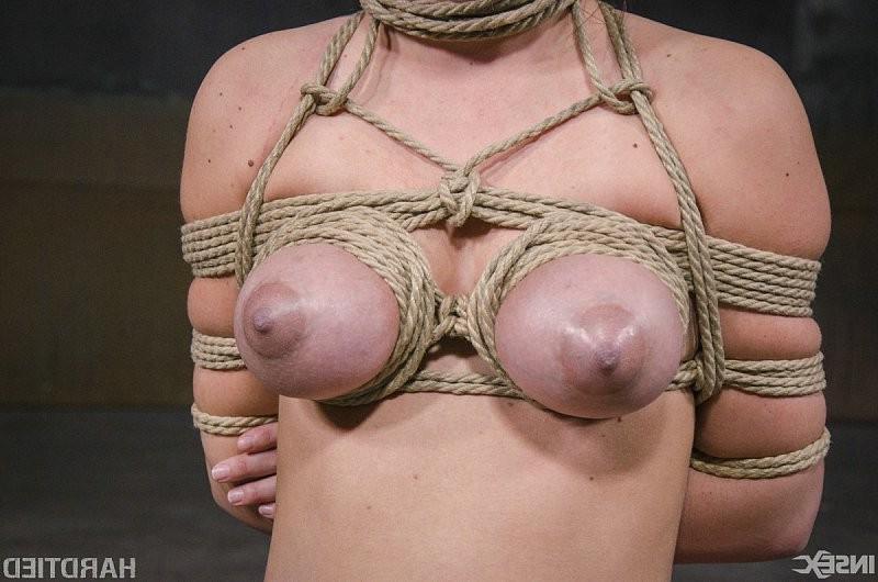 16P Charlotte Cross is bound in rope her tits exposed and mouth toye