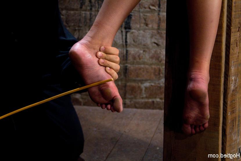 15P Katie Jordin is rope bound to a pole her nipples stretched