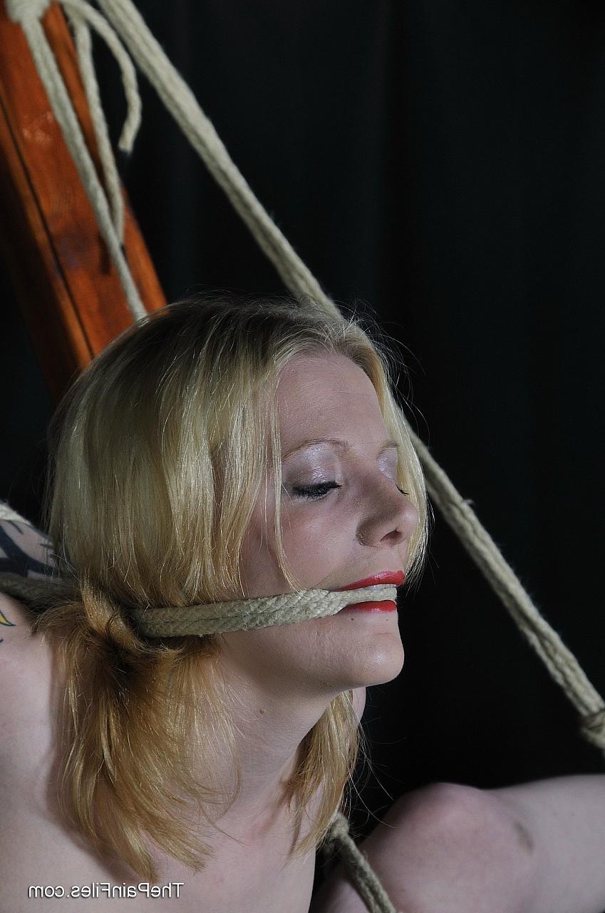 16P Cute amateur subbie Kay is bound with ropes and attached to an A