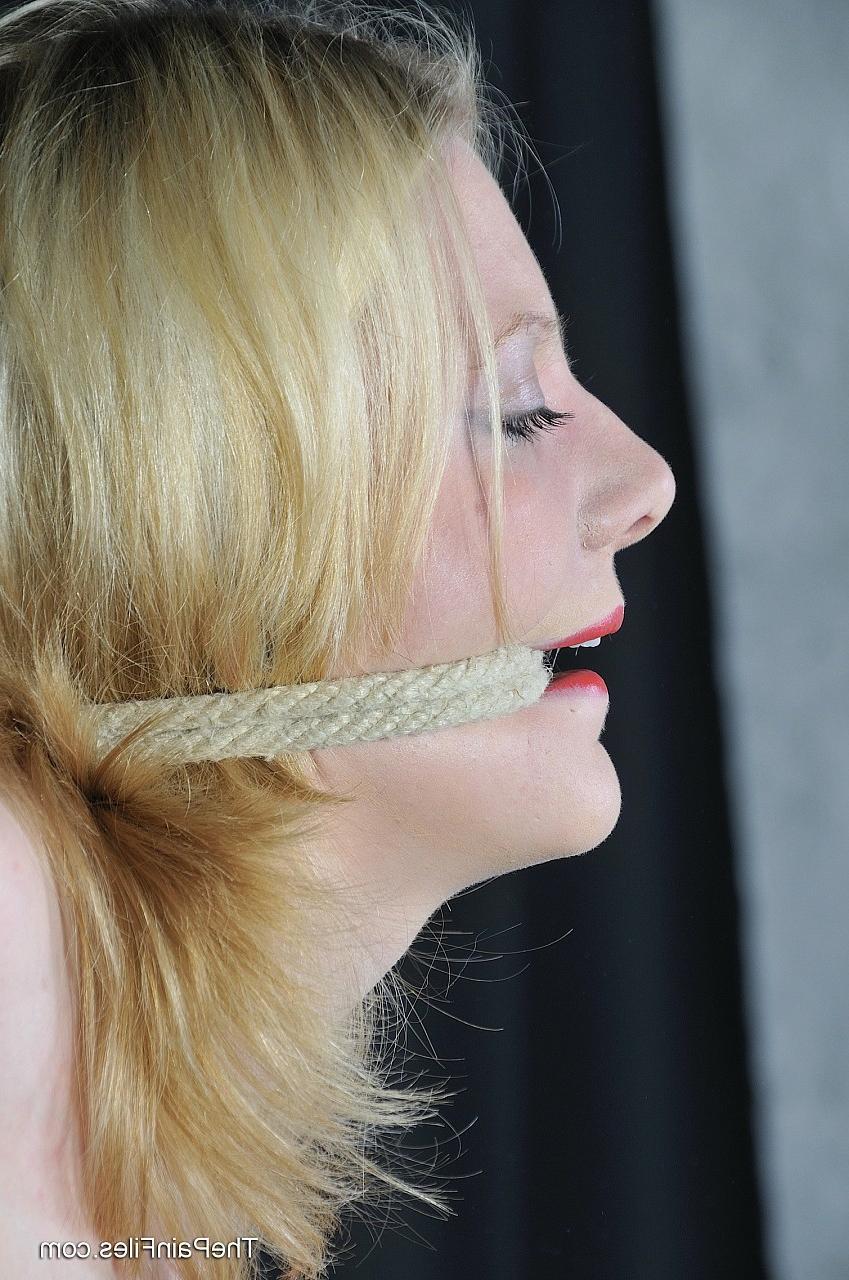 16P Cute amateur subbie Kay is bound with ropes and attached to an A