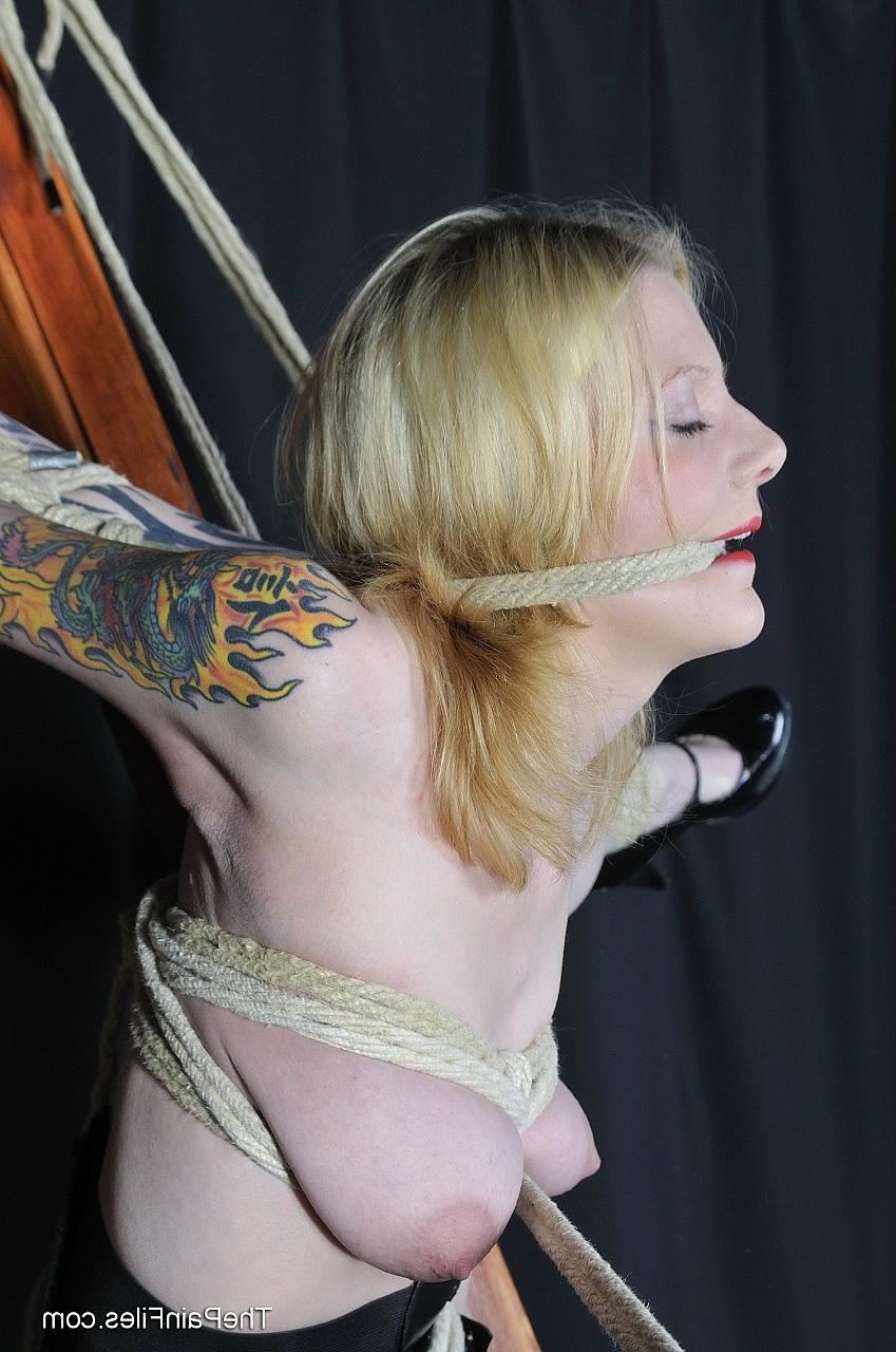 16P Cute amateur subbie Kay is bound with ropes and attached to an A