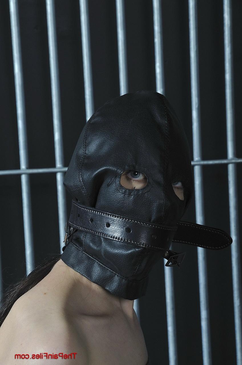 16P Busty amateur Emily is bound up and put in a leather gimp hood