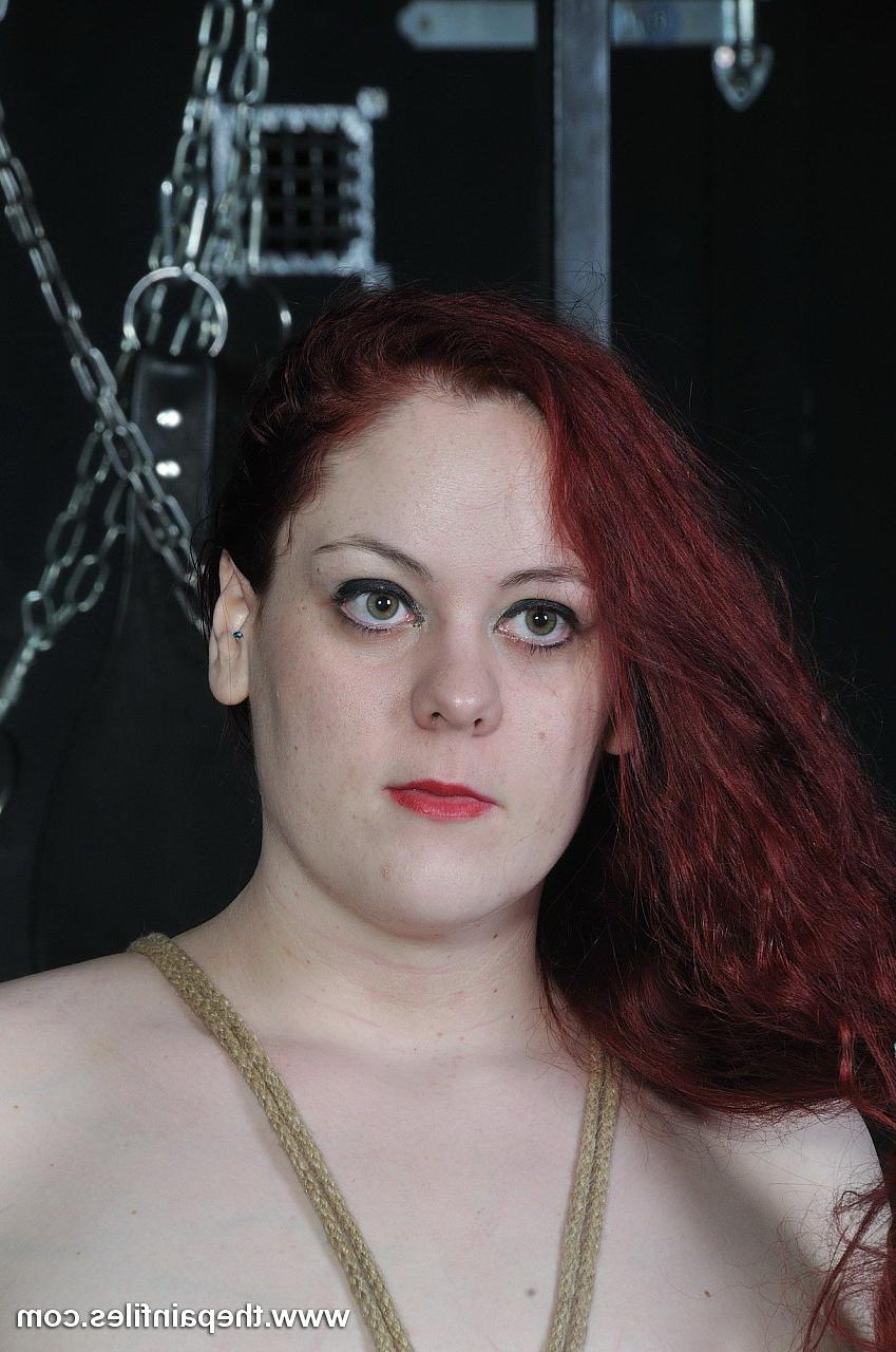 16P Amateur sub is bound to a bamboo pole by her arms by Mistress