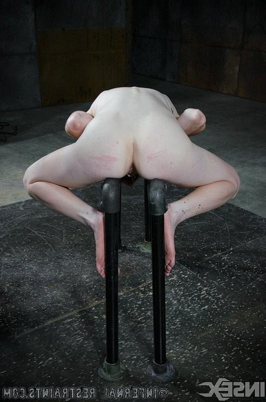 15P Ivy Addams is bound in metal pipes her tits clamped and pussy ex