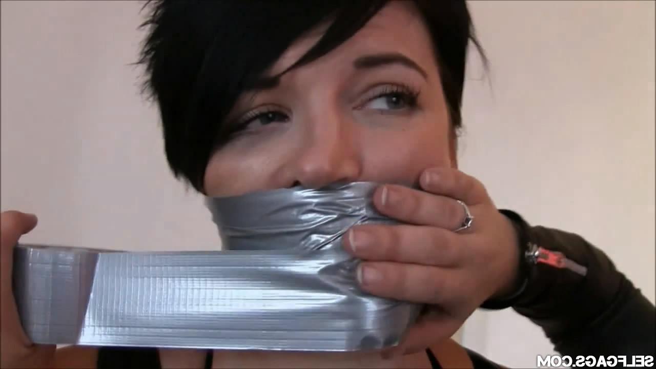 12P Two hotties tape bound by leathered female catsuit burglar