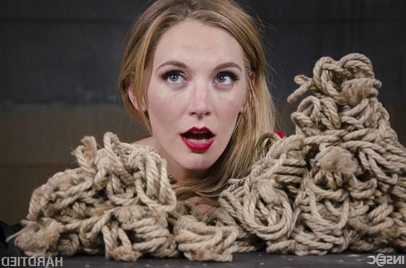 15P Mona Wales blonde in red dress is rope bound and toyed by maledo