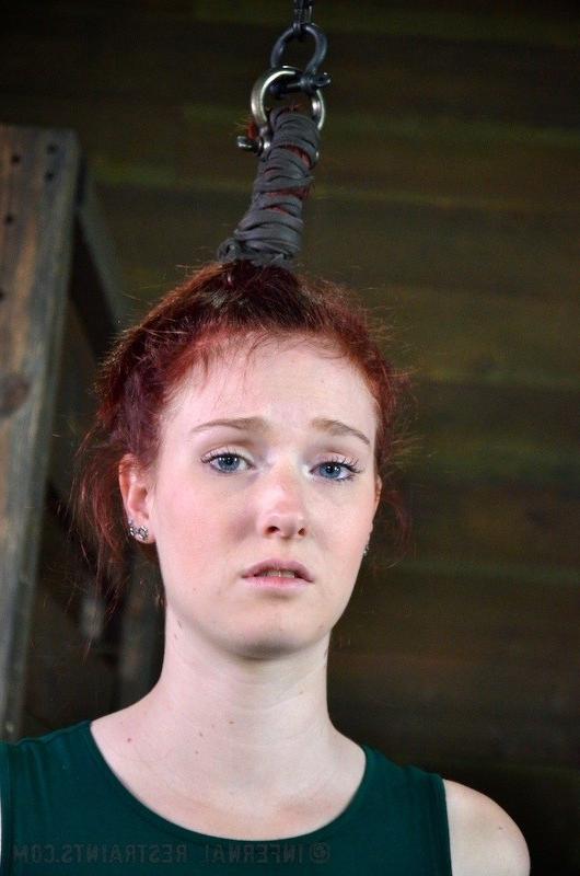 16P Ashley Lane redhead bound in dungeon with leather and dribbling