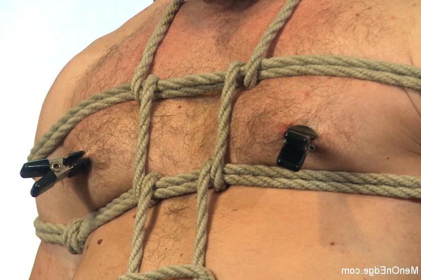 15P Hot stud is bound and has his uncut cock edged by two pervs!