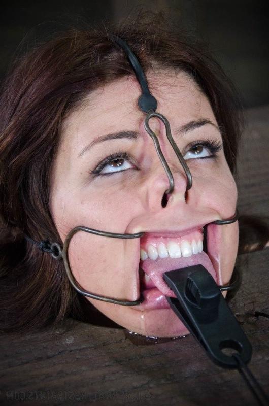 16P Mia Gold is bound in metal with leather mask and clamps