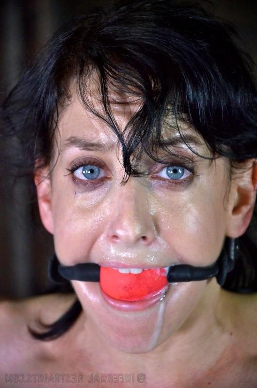 16P Elise Graves is naked bound in metal and leather with ballgag