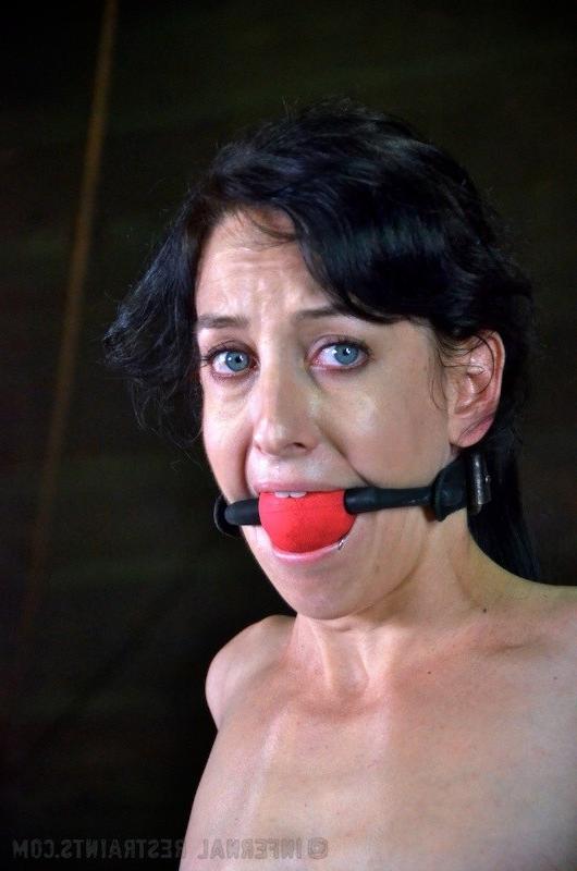 16P Elise Graves is naked bound in metal and leather with ballgag