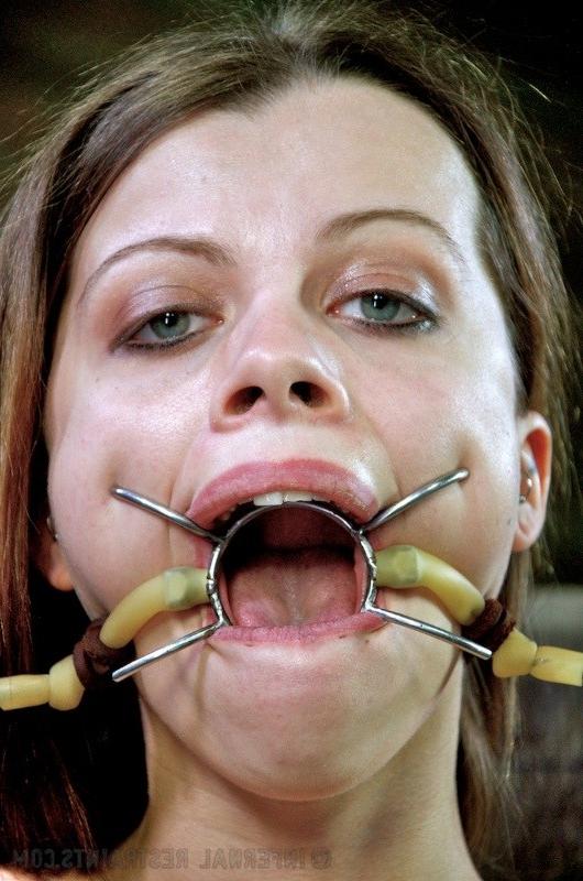 16P Nadia White is bound with tits exposed and mouth spread wide