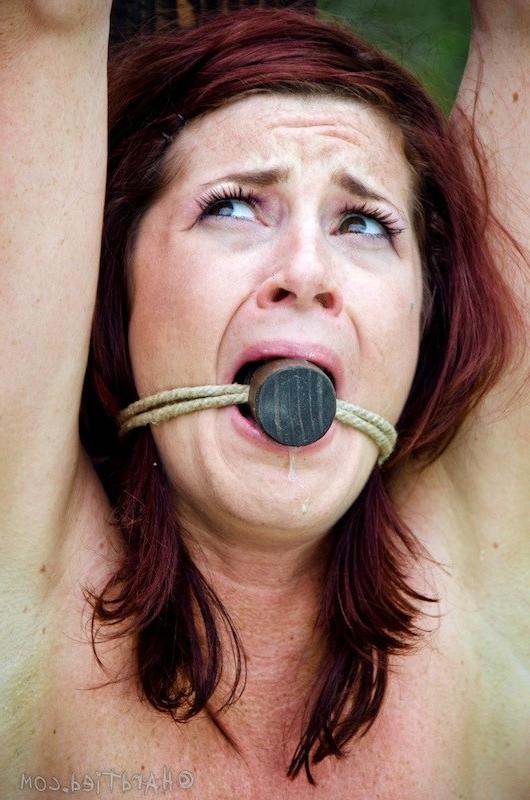 16P Cici Rhodes redhead is bound outdoors her tits with clothes pins