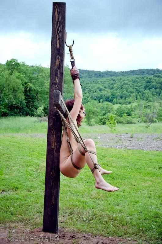 16P Cici Rhodes redhead is bound outdoors her tits with clothes pins