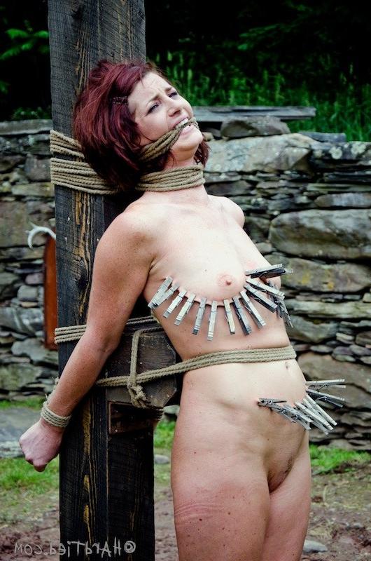 16P Cici Rhodes redhead is bound outdoors her tits with clothes pins