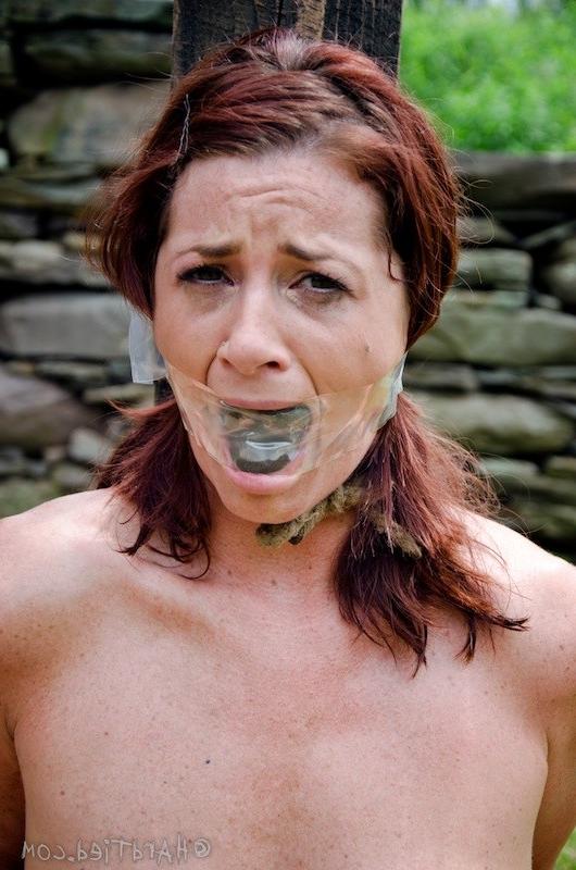 16P Cici Rhodes redhead is bound outdoors her tits with clothes pins