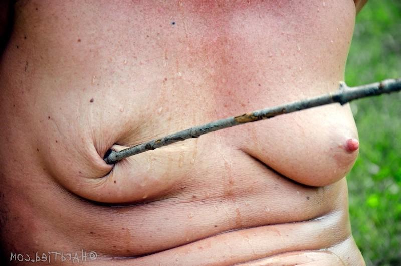 16P Cici Rhodes redhead is bound outdoors her tits with clothes pins