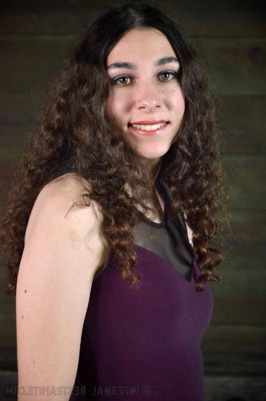16P Haley Rue curly piercing brunette is bound in leather straps