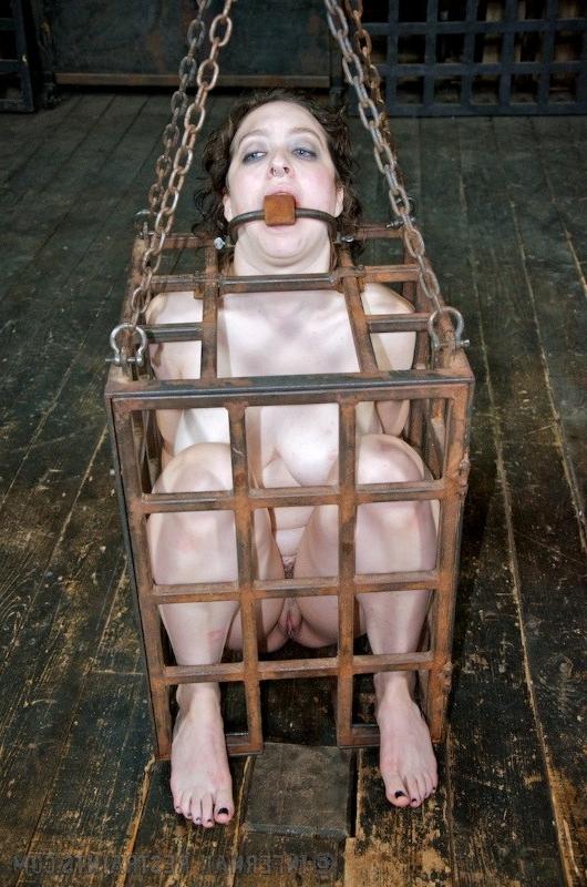 16P Dixon Mason is bound in metal her pussy exposed and toyed