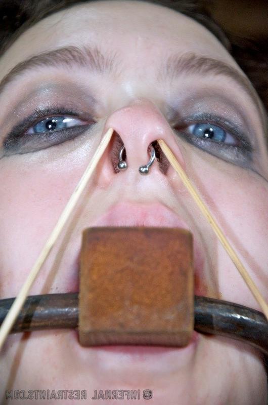 16P Dixon Mason is bound in metal her pussy exposed and toyed