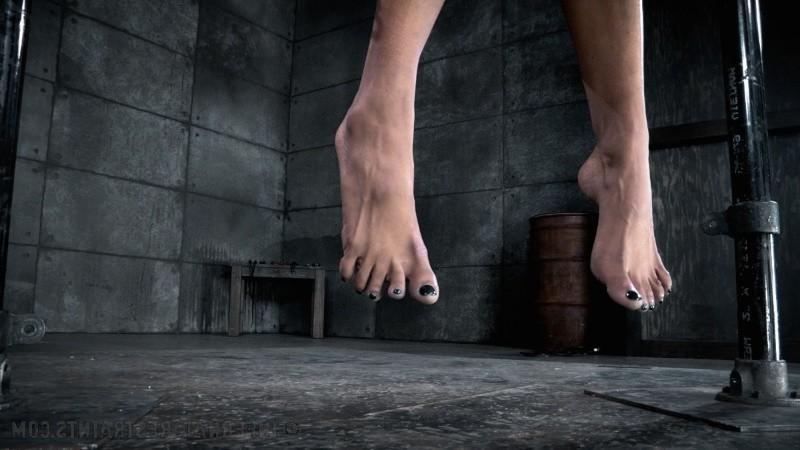 16P Nikki Darling ebony is bound in wooden stocks her feet spanked