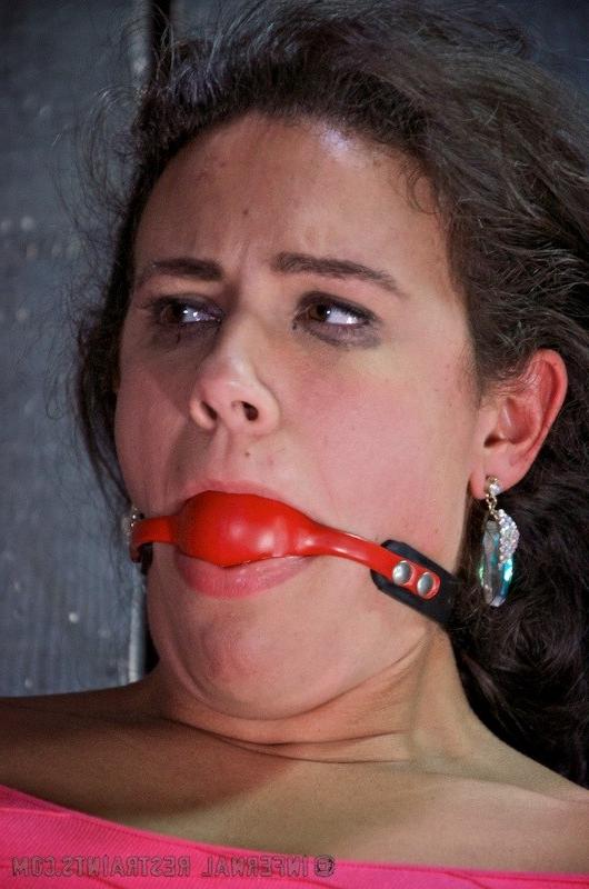 16P Penny Barber in pink dress is bound to metal bed and pussy toyed