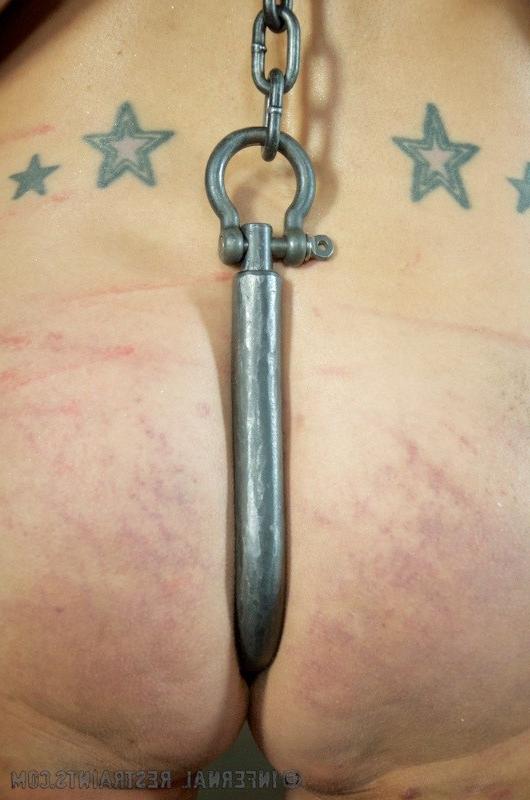 16P Rain DeGrey big tits blonde is bound in metal for pleasure