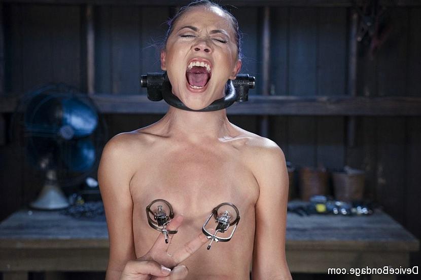 18P Kristina Rose is bound in hard steel with clamps her pussy toyed to orgasm