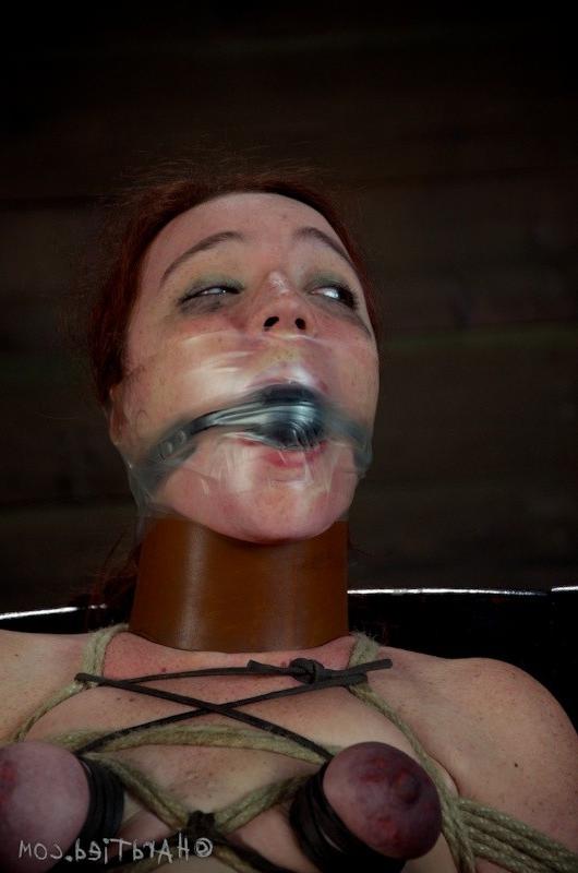 16P Maggie Mead bound in rope wearing high heels her mouth gagged