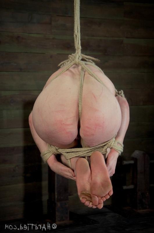 16P Maggie Mead bound in rope wearing high heels her mouth gagged