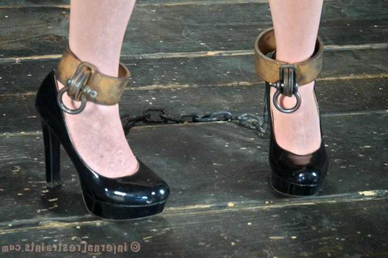 16P Maggie Mead bound in wooden stock her shaved pussy vibrated