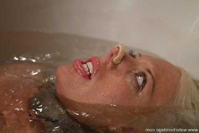 15P Tamra Toryn hot blonde is bound in prison and dunked in bathtub