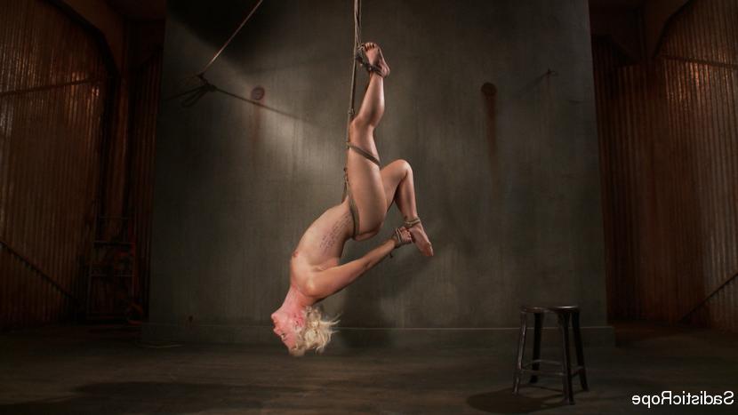 16P Dylan Ryan tall naked blonde is rope bound and spanked