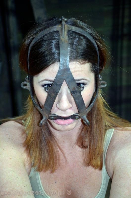 16P Cici Rhodes is bound in chains and put in cage in dungeon