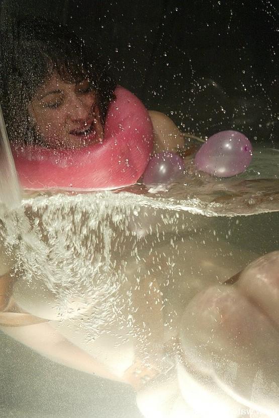 15P Stacy Stax busty babe is bound in rope and dunked in water tank