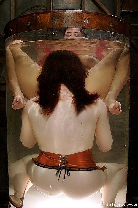 15P Annie Cruz bound in latex and rope tortured with water by lezdom