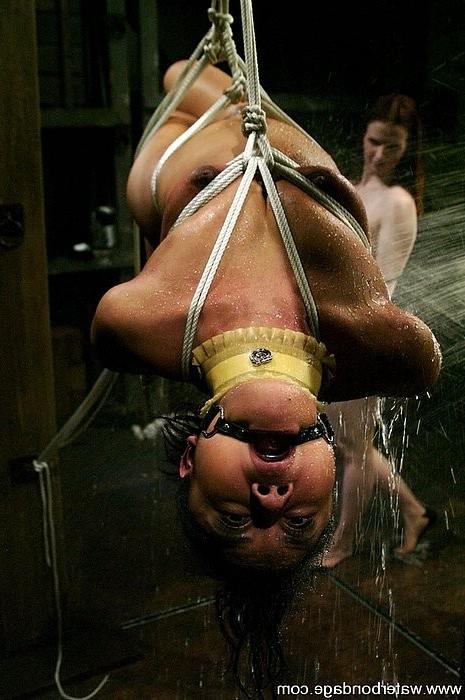 15P Annie Cruz bound in latex and rope tortured with water by lezdom