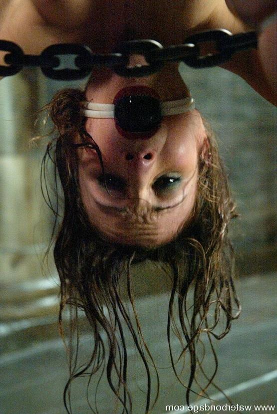 15P Amber Rayne girl is bound upside down in watertank