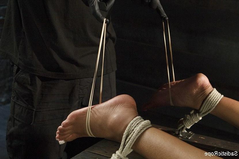 16P Lila Jordan busty ebony is rope bound with tits clampled and feet spanked