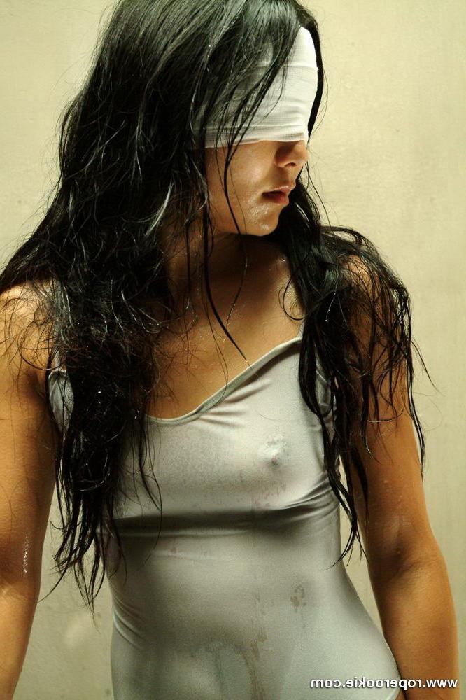 15P Asian girl in spandex body suit tied and bound.