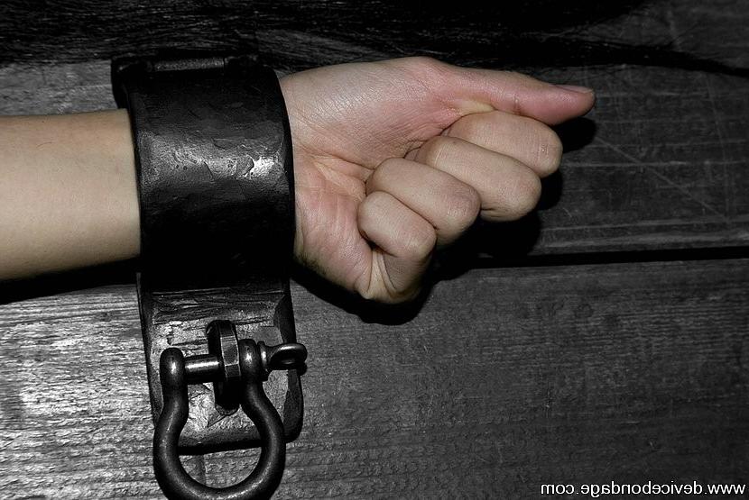 15P Circe Borges bound with metal chains clothes ripped