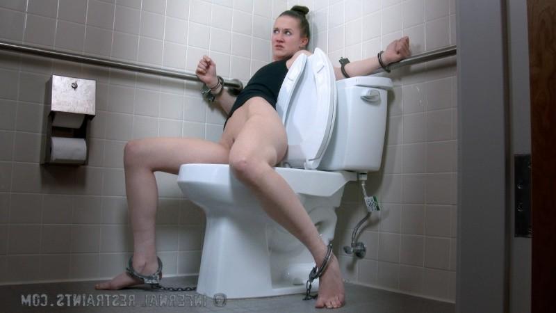 16P Bonnie Day is handcuff bound on a toiet and humiliated