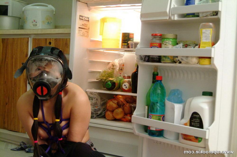 15P Yumi bound while in a gaz mask